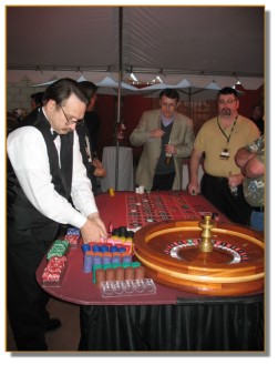 Roulette dealer organizing his chips